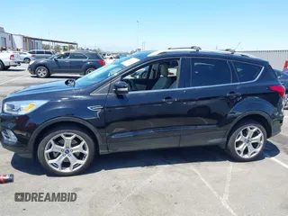2019 Ford Escape Titanium with VIN 1FMCU9J98KUA21480, listed as a IAAI auction lot 42698275 with 65,478 mi miles and . Bid and sale history available at DreamBid. Image 14.