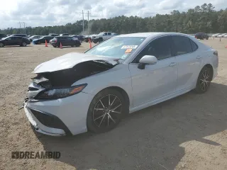 2023 Toyota Camry SE with VIN 4T1G11AK5PU164067, listed as a Copart auction lot 57873245 with 15,714 mi miles and Salvage title. Bid and sale history available at DreamBid. Image 1.