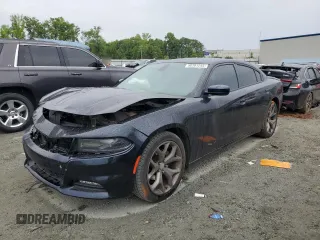 2015 Dodge Charger SXT with VIN 2C3CDXHG2FH929112, listed as a Copart auction lot 56181245 with 162,729 mi miles and Salvage title. Bid and sale history available at DreamBid. Image 1.