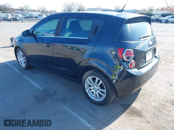 2014 Chevrolet Sonic LT with VIN 1G1JC6SB4E4151333, listed as a IAAI auction lot 41815985 with 112,123 mi miles. Bid and sale history available at carsss.com. Image 3.