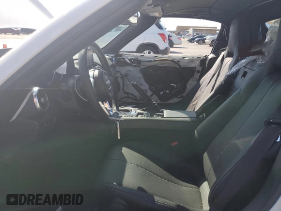 2023 Mazda MX-5 Miata Grand Touring with VIN JM1NDAM76P0561207, listed as a Copart auction lot 72202434 with 6,928 mi miles and Salvage title. Bid and sale history available at DreamBid. Image 7.