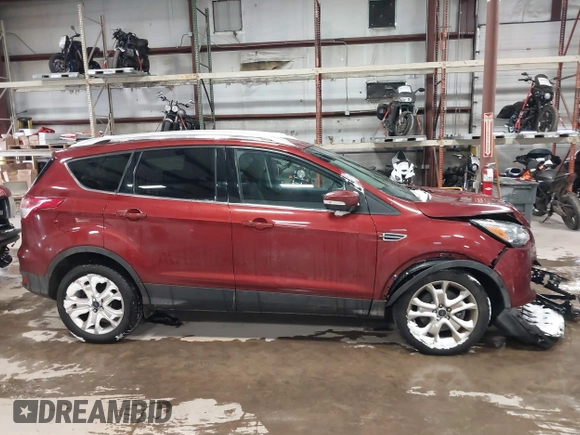 2016 Ford Escape Titanium with VIN 1FMCU9JX6GUB57497, listed as a IAAI auction lot 41375019 with 1 mi miles. Bid and sale history available at carsss.com. Image 13.
