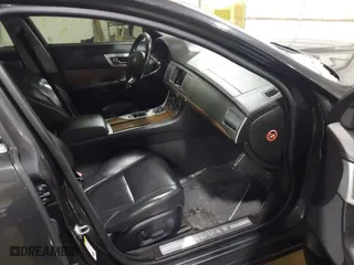 2013 Jaguar XF V6 SC with VIN SAJWJ0EF3D8S90652, listed as a IAAI auction lot 41595726 with 110,880 mi miles. Bid and sale history available at carsss.com. Image 5.