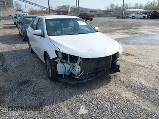 2017 Toyota Camry XLE with VIN 4T1BF1FK5HU806759, listed as a IAAI auction lot 42030394 with 82,603 mi miles and . Bid and sale history available at DreamBid. Image 1.
