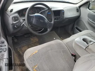 1999 Ford F-150 XL с VIN 1FTRX18L5XNB35835, выставлен на аукционе Copart как лот 52898645 с пробегом 218 637 миль миль и Списание • Salvage title. История ставок и продаж доступна на DreamBid. Изображение 8.