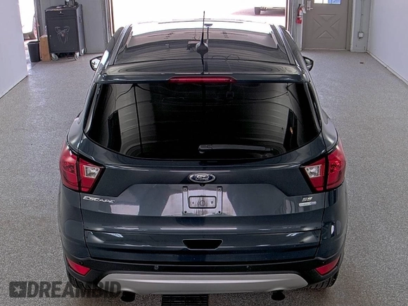 2019 Ford Escape SE z VIN 1FMCU9GD9KUA54757, wystawiony jako IAAI lot #42516631 z przebiegiem 87 040 mil mil oraz . Historia ofert i sprzedaży dostępna na DreamBid. Obrazek 19.