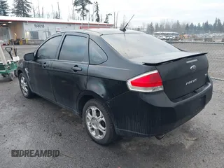 2008 Ford Focus SE with VIN 1FAHP35N08W105379, listed as a IAAI auction lot 41424575 with 210,985 mi miles. Bid and sale history available at carsss.com. Image 3.