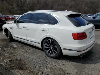 2020 Bentley Bentayga V8 z VIN SJAAM2ZV2LC028213, wystawiony jako Copart lot #52550255 z przebiegiem 50 238 mil mil oraz Szkody całkowita. Historia ofert i sprzedaży dostępna na DreamBid. Obrazek 2.