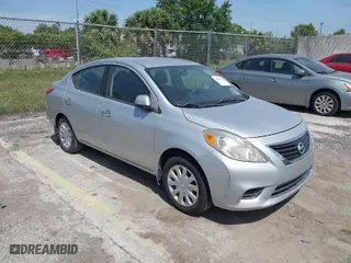 2012 Nissan Versa SV with VIN 3N1CN7AP0CL855813, listed as a IAAI auction lot 42083583 with 76,553 mi miles. Bid and sale history available at carsss.com. Image 1.