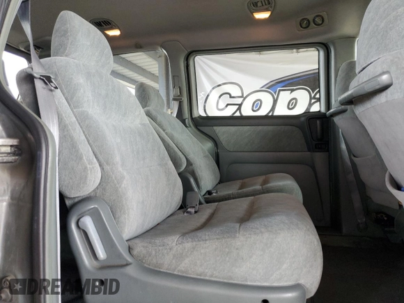 2000 Honda Odyssey EX с VIN 2HKRL1867YH555314, выставлен на аукционе Copart как лот 61065505 с пробегом 165 993 миль миль и Списание • Salvage title. История ставок и продаж доступна на DreamBid. Изображение 11.
