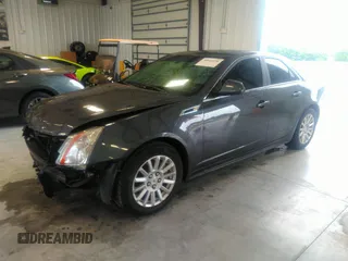 2013 Cadillac CTS Luxury with VIN 1G6DE5E54D0156491, listed as a IAAI auction lot 39844556 with 104,089 mi miles and . Bid and sale history available at DreamBid. Image 2.