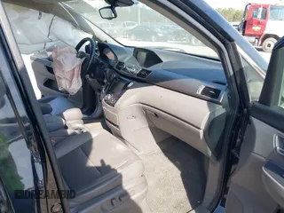 2015 Honda Odyssey EX-L with VIN 5FNRL5H65FB088106, listed as a IAAI auction lot 41880915 with 176,539 mi miles and . Bid and sale history available at carsss.com. Image 5.