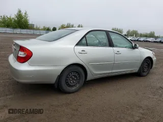 2004 Toyota Camry LE with VIN 4T1BE30K64U323377, listed as a Copart auction lot 58249465 with 274,902 mi miles and Salvage title. Bid and sale history available at DreamBid. Image 3.