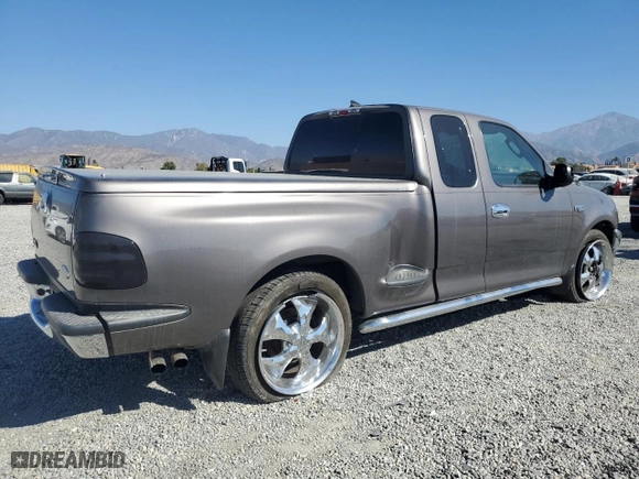 2003 Ford F-150 XL with VIN 1FTRX07233KC40260, listed as a Copart auction lot 78007404 with 85,222 mi miles and Salvage Title. Bid and sale history available at carsss.com. Image 3.