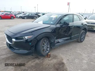 2021 Mazda CX-30 2.5 S with VIN 3MVDMAAL2MM303321, listed as a IAAI auction lot 41583346 with 57,122 mi miles. Bid and sale history available at carsss.com. Image 17.