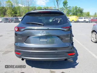 2021 Mazda CX-9 Touring with VIN JM3TCACY7M0503484, listed as a IAAI auction lot 42013262 with 63,777 mi miles and . Bid and sale history available at DreamBid. Image 17.