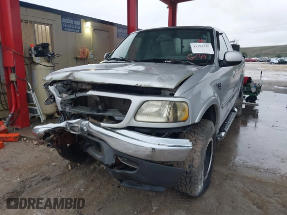 2003 Ford F-150 XL with VIN 1FTRX18W53NA09107, listed as a IAAI auction lot 41394520 with 187,489 mi miles. Bid and sale history available at carsss.com. Image 2.