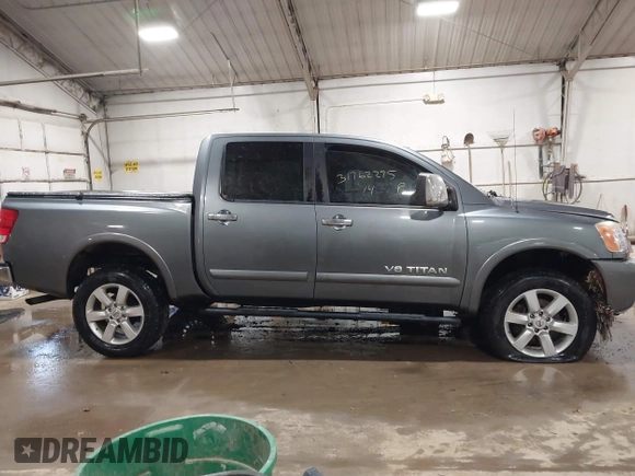 2014 Nissan Titan S with VIN 1N6AA0EC6EN513801, listed as a IAAI auction lot 41762295 with 128,412 mi miles and . Bid and sale history available at DreamBid. Image 13.