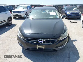 2015 Volvo S60 T5 Drive-E Premier with VIN YV140MFK5F2360714, listed as a IAAI auction lot 42043000 with 170,062 mi miles. Bid and sale history available at carsss.com. Image 6.