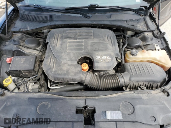 2014 Dodge Charger SE with VIN 2C3CDXBG9EH370942, listed as a Copart auction lot 69511654 with 220,917 mi miles and Salvage Title. Bid and sale history available at carsss.com. Image 11.
