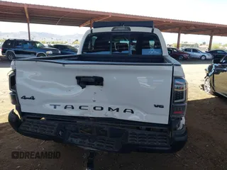 2016 Toyota Tacoma SR with VIN 5TFCZ5ANXGX028464, listed as a IAAI auction lot 41834385 with 124,407 mi miles and . Bid and sale history available at DreamBid. Image 6.
