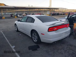 2013 Dodge Charger SE with VIN 2C3CDXBG1DH539849, listed as a IAAI auction lot 41673743 with 191,665 mi miles. Bid and sale history available at carsss.com. Image 3.