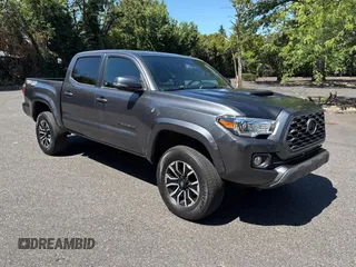 2022 Toyota Tacoma SR with VIN 3TYCZ5AN8NT058506, listed as a Copart auction lot 66566945 with 38,027 mi miles and Salvage title. Bid and sale history available at DreamBid. Image 1.