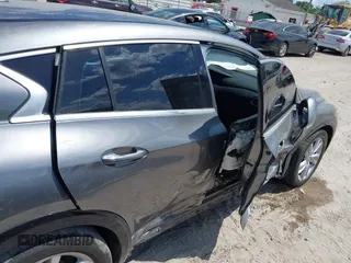 2018 Infiniti QX30 Premium z VIN SJKCH5CPXJA003377, wystawiony jako IAAI lot #41876556 z przebiegiem 91 673 mil mil oraz . Historia ofert i sprzedaży dostępna na DreamBid. Obrazek 19.