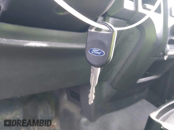 2013 Ford F-150 XL with VIN 1FTMF1CM1DKG40796, listed as a IAAI auction lot 41208425 with 154,987 mi miles and . Bid and sale history available at carsss.com. Image 11.