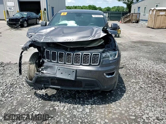 2019 Jeep Grand Cherokee Laredo E z VIN 1C4RJFAG4KC636067, wystawiony jako Copart lot #59232885 z przebiegiem Nie podano mil oraz Szkoda całkowita • Salvage title. Historia ofert i sprzedaży dostępna na DreamBid. Obrazek 14.