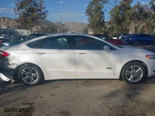 2016 Ford Fusion Energi Titanium with VIN 3FA6P0SU5GR144908, listed as a IAAI auction lot 41701812 with 98,332 mi miles. Bid and sale history available at carsss.com. Image 13.