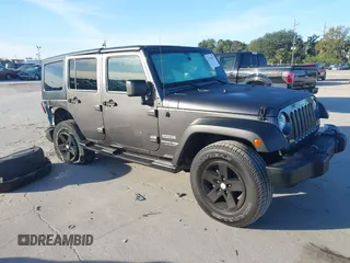 2018 Jeep Wrangler JK Unlimited Sport S with VIN 1C4BJWDG3JL900973, listed as a IAAI auction lot 41239817 with 50,952 mi miles. Bid and sale history available at carsss.com. Image 14.