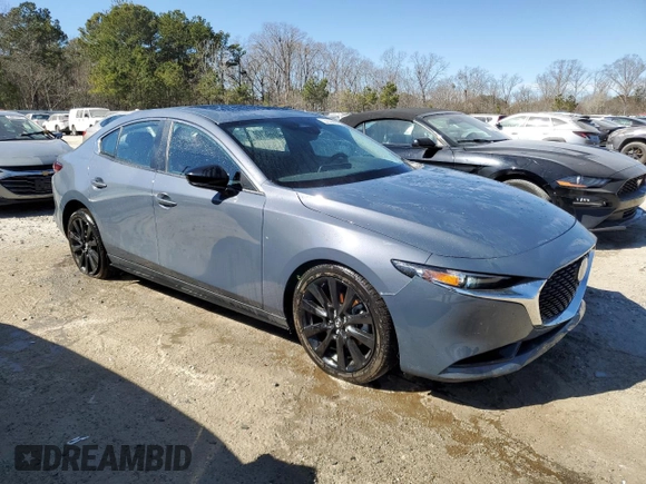 2025 Mazda 3 S Carbon Edition with VIN JM1BPBCM4S1764302, listed as a Copart auction lot 46692245 with 5,099 mi miles and Clean Title. Bid and sale history available at DreamBid. Image 4.