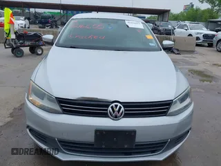 2013 Volkswagen Jetta SE with VIN 3VWDX7AJXDM373706, listed as a IAAI auction lot 42161655 with 202,471 mi miles and . Bid and sale history available at DreamBid. Image 12.