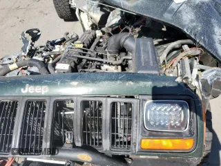 1998 Jeep Cherokee Sport with VIN 1J4FJ68S3WL237566, listed as a Copart auction lot 67380164 with 0 mi miles and Non Repairable. Bid and sale history available at carsss.com. Image 11.