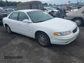 2000 Buick Regal LS z VIN 2G4WB55K0Y1255495, wystawiony jako IAAI lot #42422878 z przebiegiem 79 802 mil mil oraz . Historia ofert i sprzedaży dostępna na DreamBid. Obrazek 1.