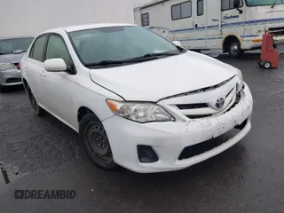 2012 Toyota Corolla L with VIN JTDBU4EE2C9180882, listed as a IAAI auction lot 41530091 with 128,553 mi miles. Bid and sale history available at carsss.com. Image 1.