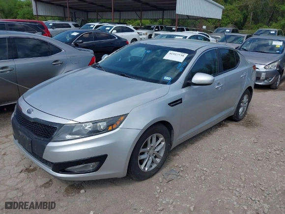 2012 Kia Optima LX with VIN 5XXGM4A77CG074198, listed as a IAAI auction lot 41927738 with 163,697 mi miles. Bid and sale history available at carsss.com. Image 2.