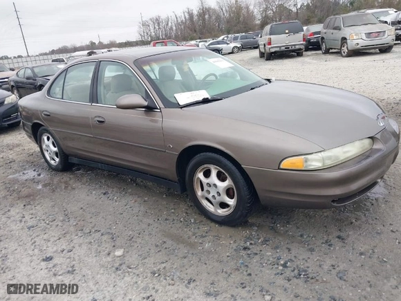 1999 Oldsmobile Intrigue GLS with VIN 1G3WX52H6XF321750, listed as a IAAI auction lot 41505500 with 180,036 mi miles. Bid and sale history available at carsss.com. Image 1.