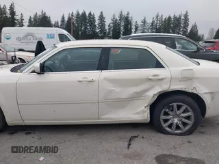 2007 Chrysler 300 Touring with VIN 2C3LA53GX7H871255, listed as a IAAI auction lot 41317732 with 145,223 mi miles and . Bid and sale history available at DreamBid. Image 13.