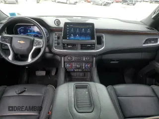2023 Chevrolet Tahoe Premier with VIN 1GNSKSKD0PR217513, listed as a Copart auction lot 54702845 with 55,424 mi miles and Salvage title. Bid and sale history available at DreamBid. Image 8.