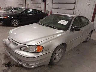 2003 Pontiac Grand Am GT with VIN 1G2NW52E93M605453, listed as a IAAI auction lot 41546839 with 202,918 mi miles. Bid and sale history available at carsss.com. Image 2.