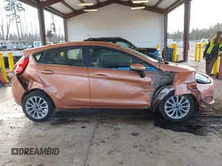 2017 Ford Fiesta Titanium with VIN 3FADP4FJ6HM139455, listed as a IAAI auction lot 41533050 with 104,788 mi miles and . Bid and sale history available at DreamBid. Image 13.