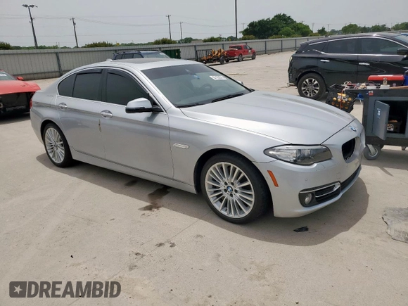 2016 BMW 5 Series 550i with VIN WBAKN9C57GD962477, listed as a Copart auction lot 57103575 with 57,574 mi miles and Clean title. Bid and sale history available at DreamBid. Image 1.