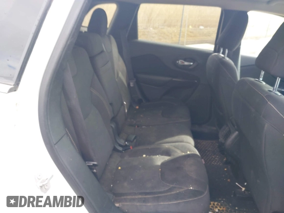 2016 Jeep Cherokee 75th Anniversary with VIN 1C4PJLCB4GW287862, listed as a IAAI auction lot 42030424 with 132,812 mi miles and . Bid and sale history available at DreamBid. Image 8.