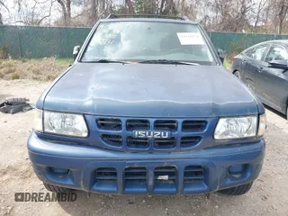 2002 Isuzu Rodeo S with VIN 4S2CK58W124320988, listed as a IAAI auction lot 41921874 with 227,320 mi miles and . Bid and sale history available at DreamBid. Image 6.