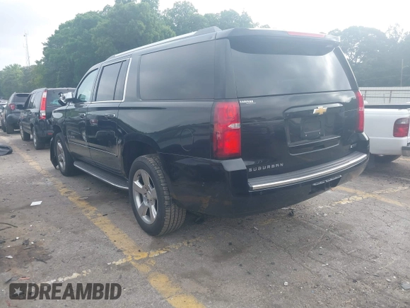 2018 Chevrolet Suburban Premier with VIN 1GNSCJKC9JR100504, listed as a IAAI auction lot 42276280 with 153,916 mi miles and . Bid and sale history available at DreamBid. Image 3.