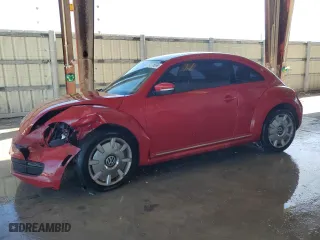 2012 Volkswagen Beetle 2.5L with VIN 3VWJX7AT7CM662822, listed as a Copart auction lot 74215804 with 115,890 mi miles and Salvage Title. Bid and sale history available at carsss.com. Image 1.