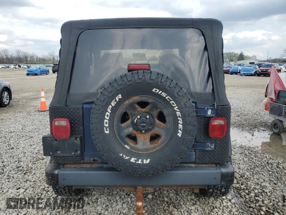 1997 Jeep Wrangler Sport with VIN 1J4FY19S4VP449011, listed as a Copart auction lot 52225715 with 145,814 mi miles and Clean Title. Bid and sale history available at carsss.com. Image 6.