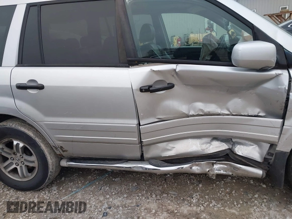2005 Honda Pilot EX-L with RES with VIN 5FNYF186X5B062577, listed as a IAAI auction lot 42018093 with 209,321 mi miles. Bid and sale history available at carsss.com. Image 13.
